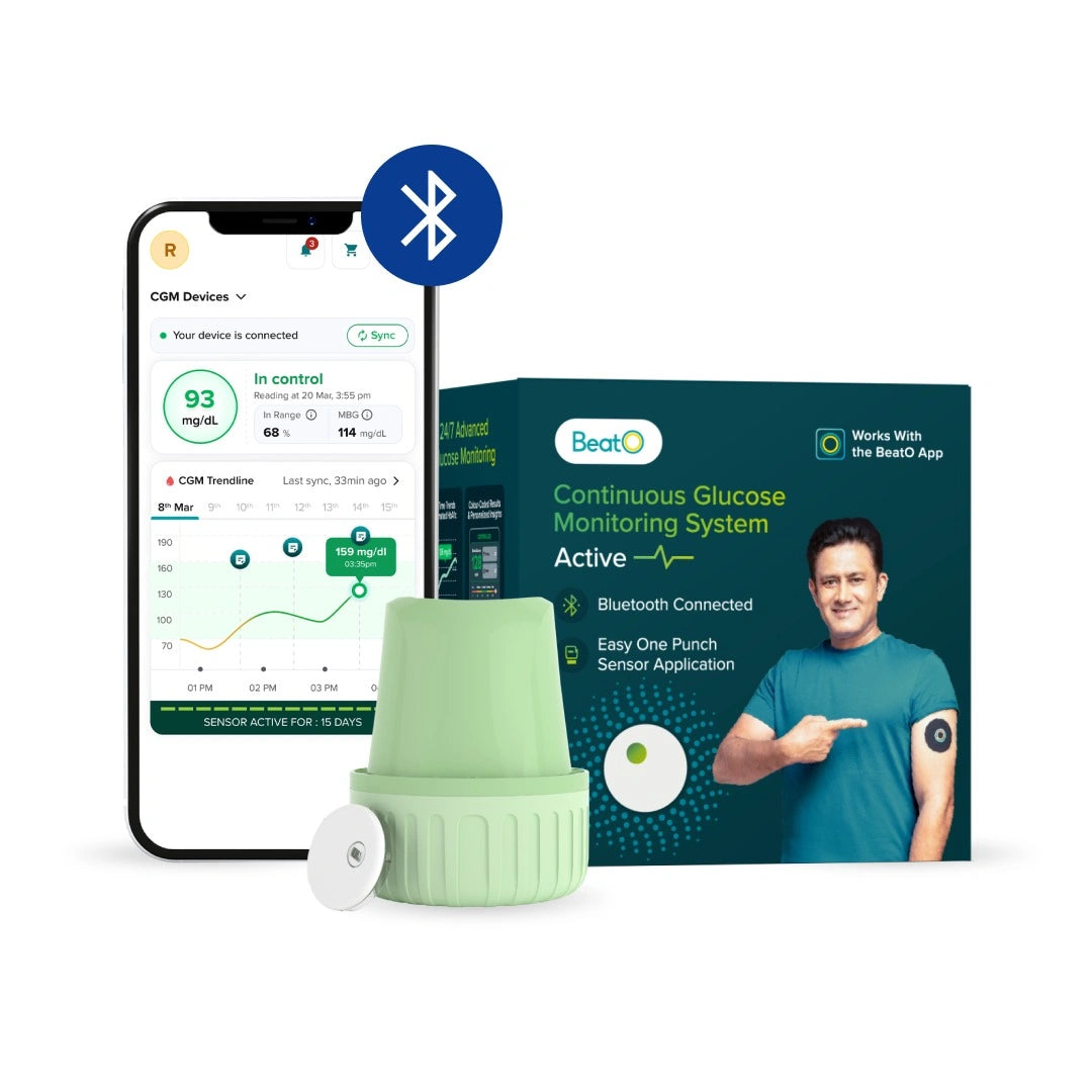 Continuous Glucose Monitoring System with smartphone app and packaging on a white background