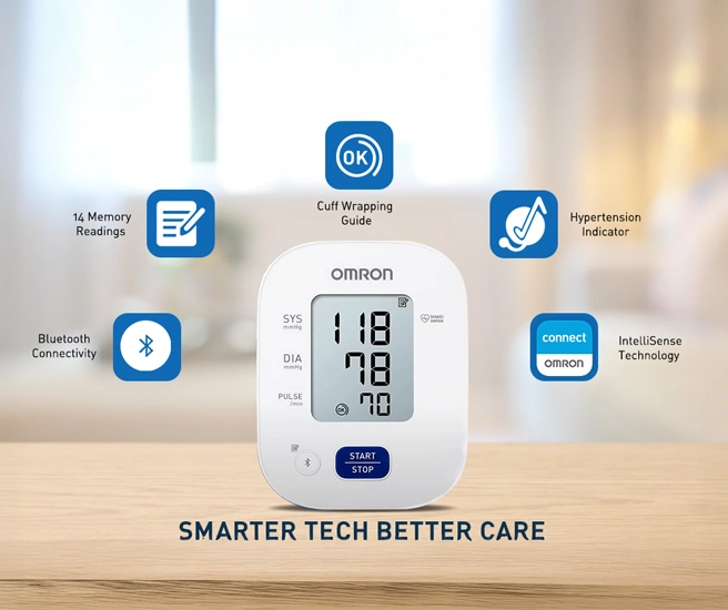 Omron blood pressure monitor with features displayed on a blurred background