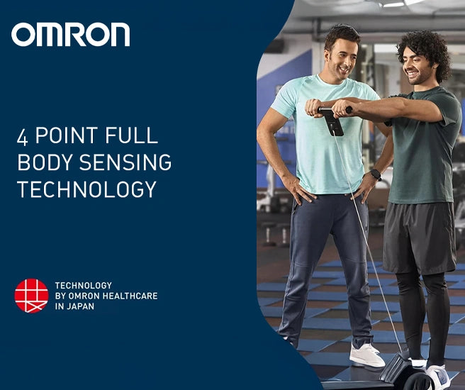Two men using Omron healthcare technology in a gym setting with Omron branding.